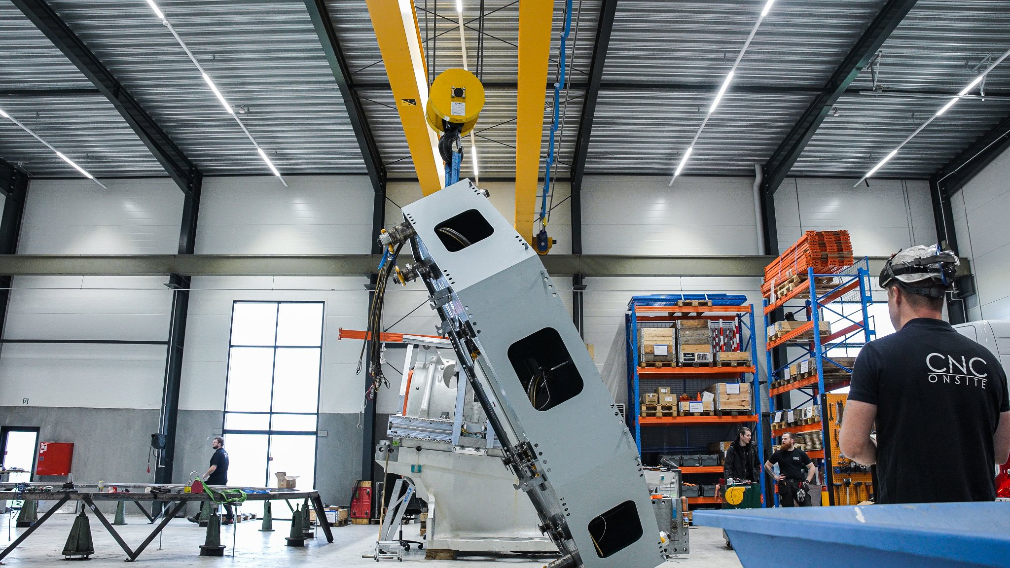 CNC Onsite employees working at the company's technical center in Vejle.
